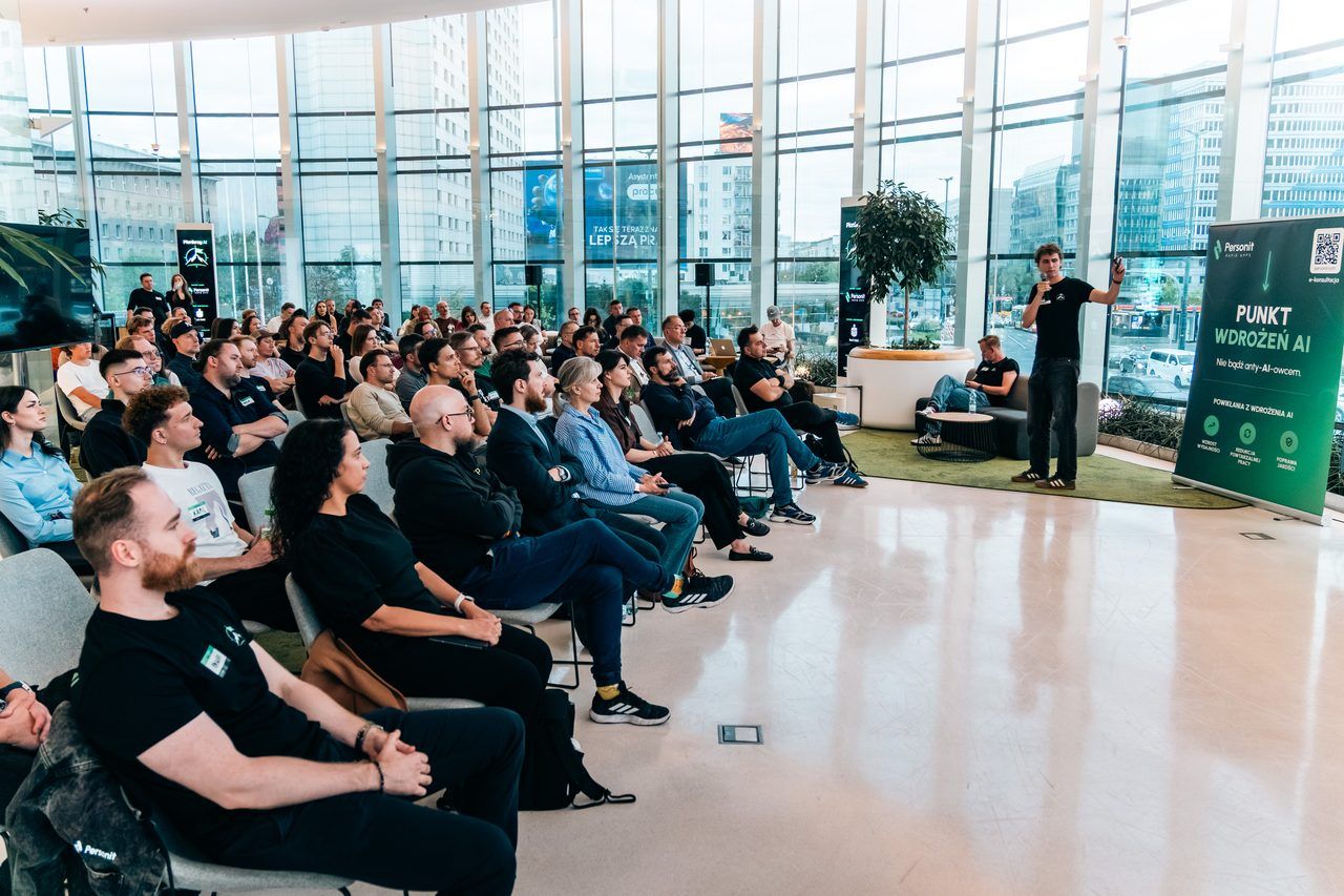 A talk on AI implementation to a full room at Pionierzy AI in the Rotunda, Warsaw